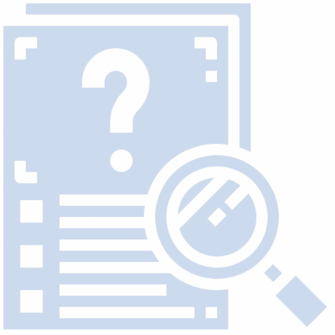 A man in a blue jacket and beige pants sitting on the floor against a white wall.