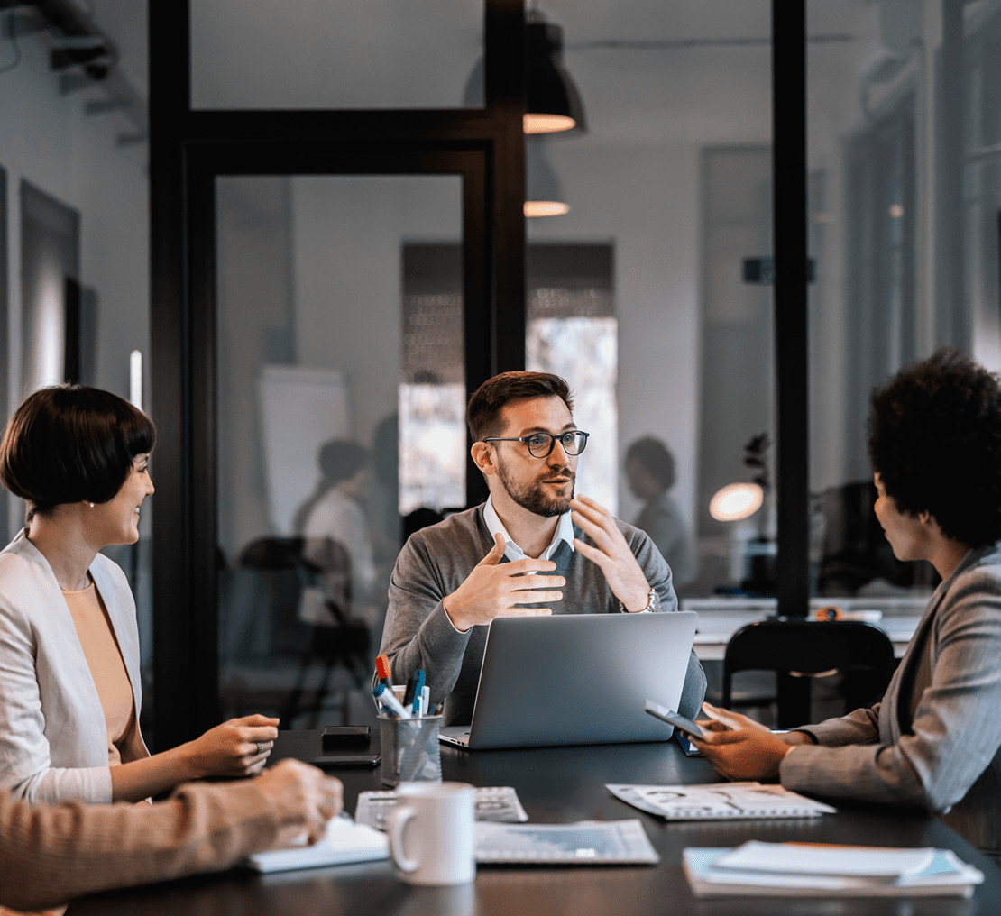 Business meeting with a man presenting ideas to colleagues.