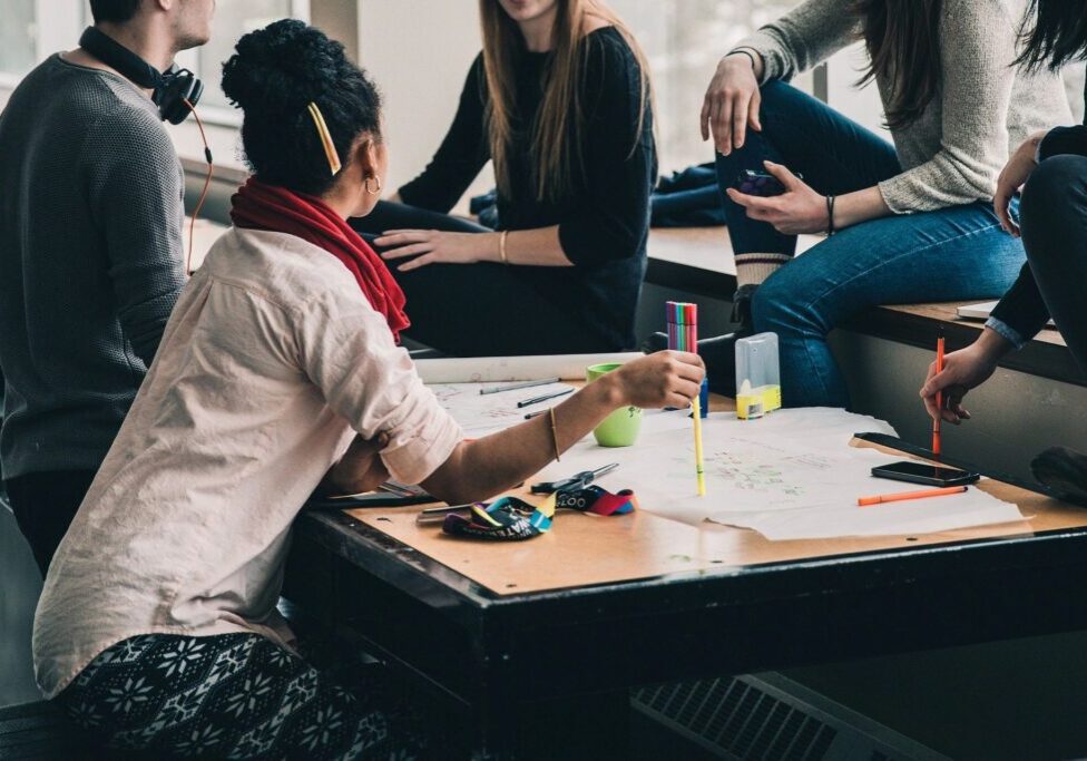 Group of people collaborating at a table.